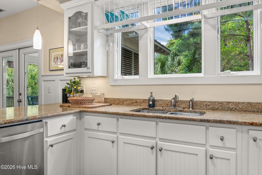 Discover this charming, well-kept secret nestled right in the - photo 14