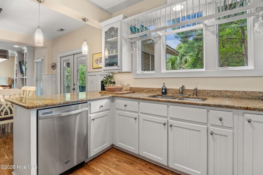 Discover this charming, well-kept secret nestled right in the - photo 16