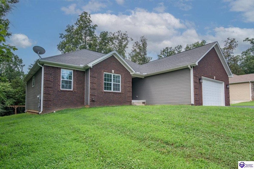 Welcome home to this beautiful ranch nestled in the highly - photo 3