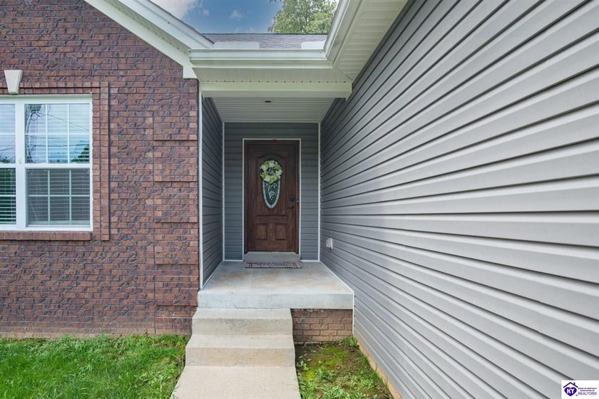 Welcome home to this beautiful ranch nestled in the highly - photo 4