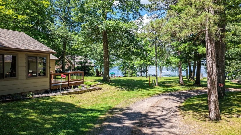 Escape to this charming four-season cabin on highly sought-after - photo 3