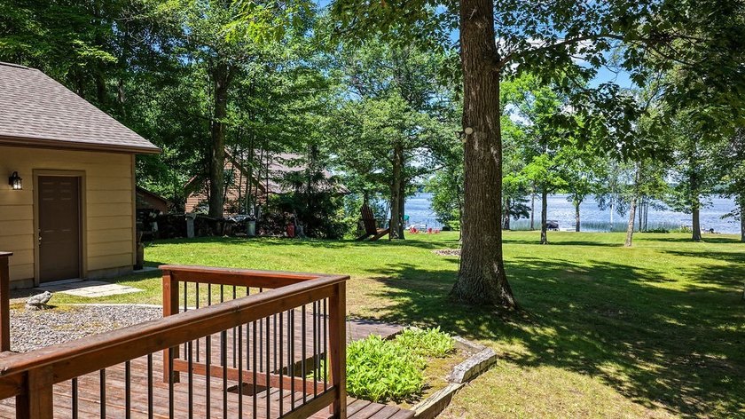 Escape to this charming four-season cabin on highly sought-after - photo 5