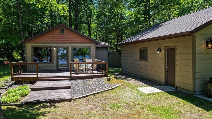 Escape to this charming four-season cabin on highly sought-after - photo 6