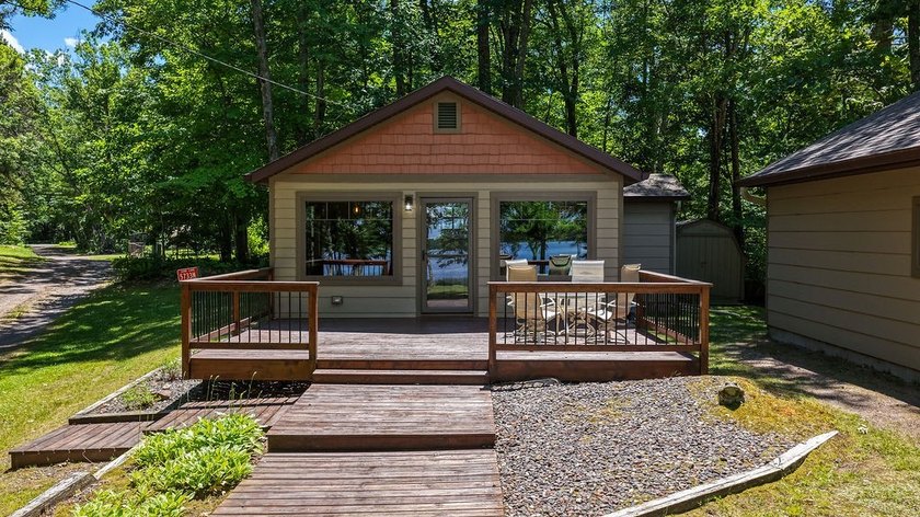 Escape to this charming four-season cabin on highly sought-after - photo 7