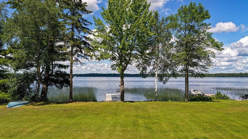 Escape to this charming four-season cabin on highly sought-after - photo 9