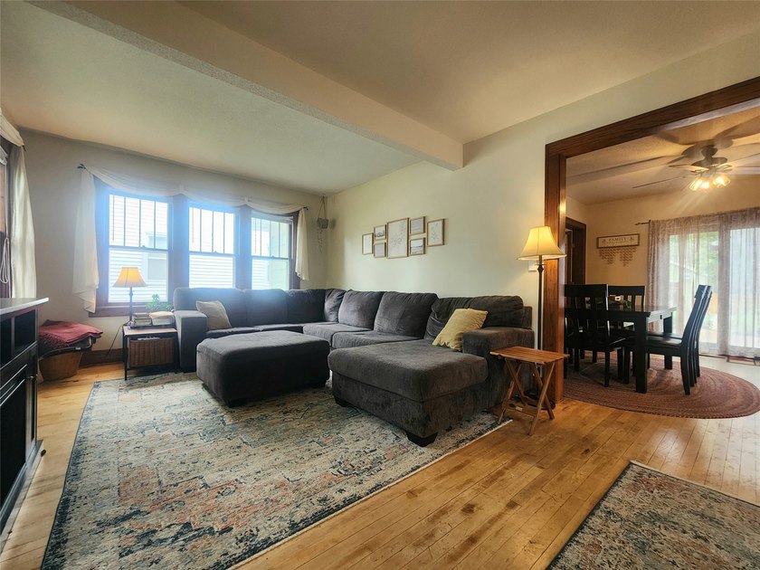 Nestled in a quiet, tree-lined neighborhood, this three-bedroom - photo 6