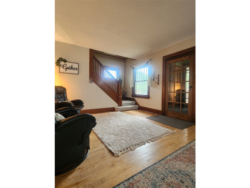 Nestled in a quiet, tree-lined neighborhood, this three-bedroom - photo 8