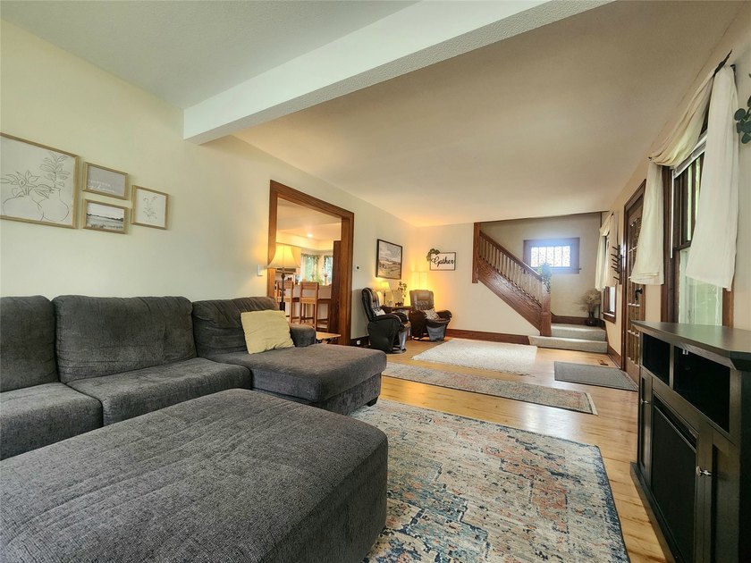 Nestled in a quiet, tree-lined neighborhood, this three-bedroom - photo 9