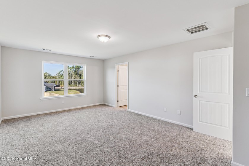 The Magnolia plan by Smith Family Homes is under construction in - photo 18