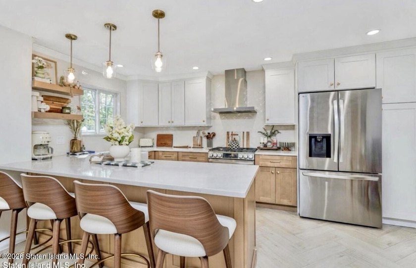 Discover the exceptional charm of this meticulously renovated - photo 8
