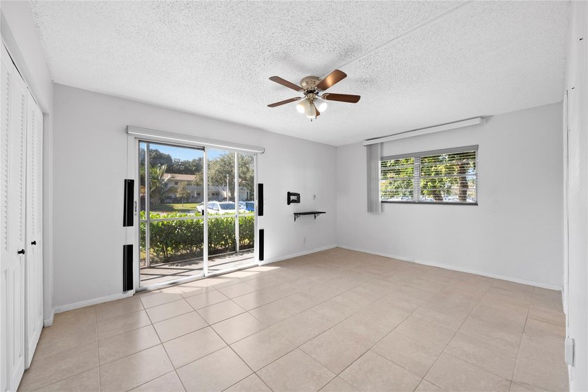 Spacious 1-bedroom, 1.5-bathroom condo conveniently located on - photo 13