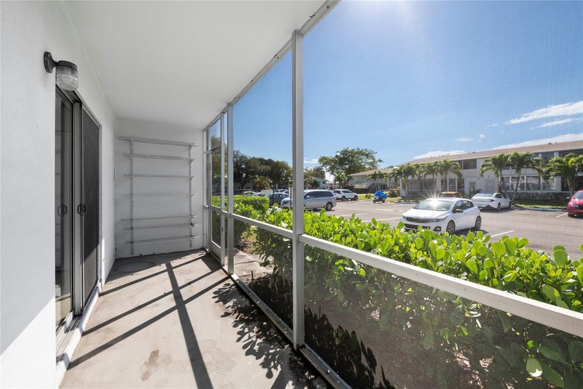 Spacious 1-bedroom, 1.5-bathroom condo conveniently located on - photo 18