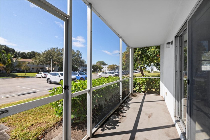 Spacious 1-bedroom, 1.5-bathroom condo conveniently located on - photo 19
