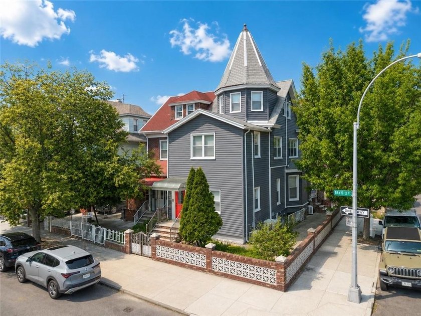 This semi-detached two-family corner home offers exceptional - photo 3