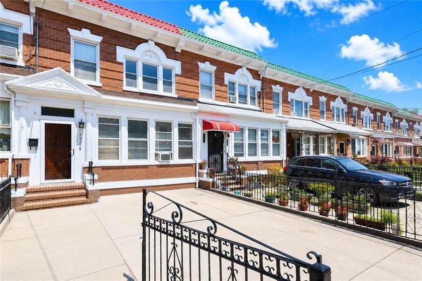 Welcome to this legal two-family solid brick home, conveniently - photo 4