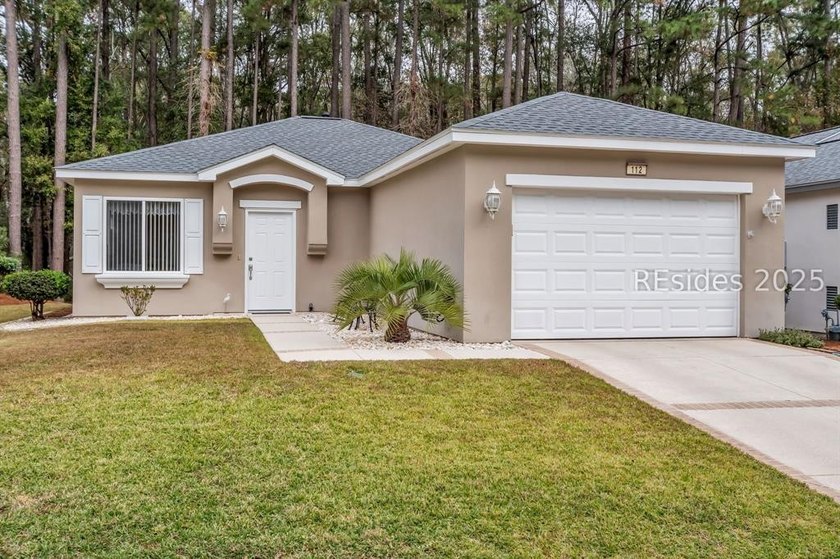 Step into this beautifully landscaped Acadia model, meticulously - photo 4