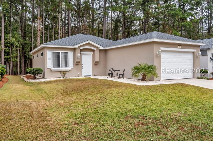 Step into this beautifully landscaped Acadia model, meticulously - photo 5