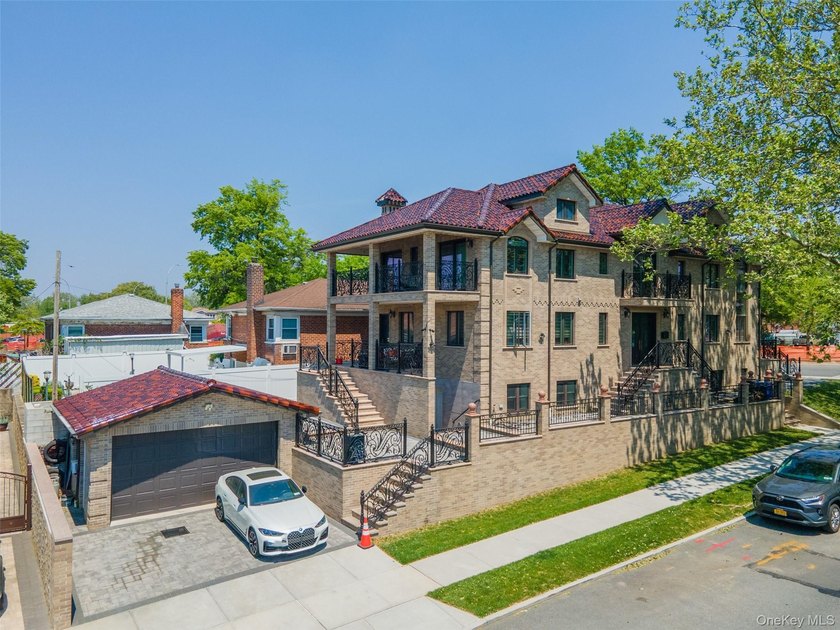 Welcome to this luxury detached two-family residence located in - photo 5
