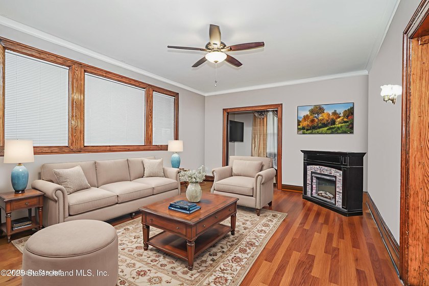 Welcome to 201 Van Name Avenue - a beautifully renovated - photo 5