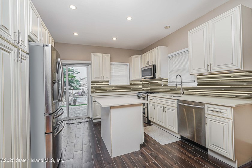 Welcome to 201 Van Name Avenue - a beautifully renovated - photo 9