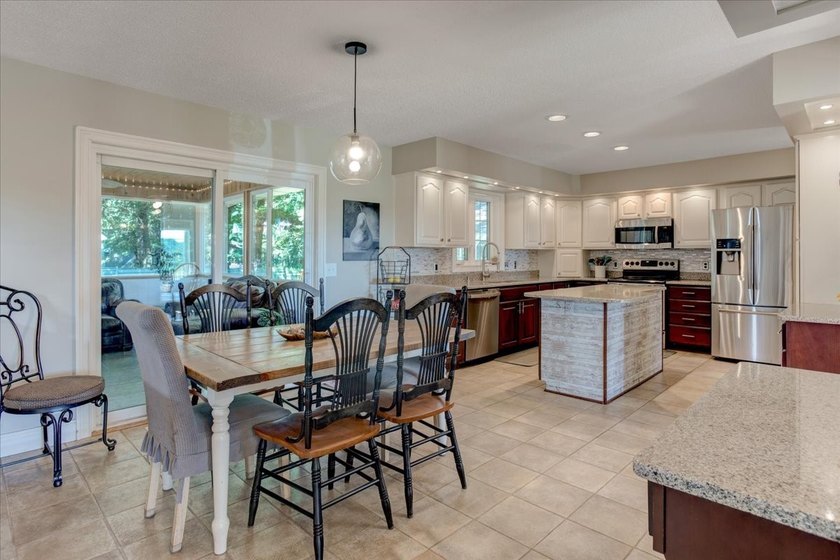 This beautifully updated Colonial-inspired home offers timeless - photo 8