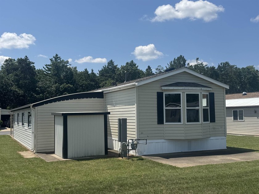 Located in the desirable 55+ Pirco community, this beautifully - photo 2