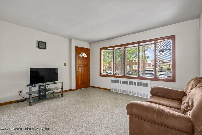Extremely well-maintained 2-family Cape in the heart of Dongan - photo 6