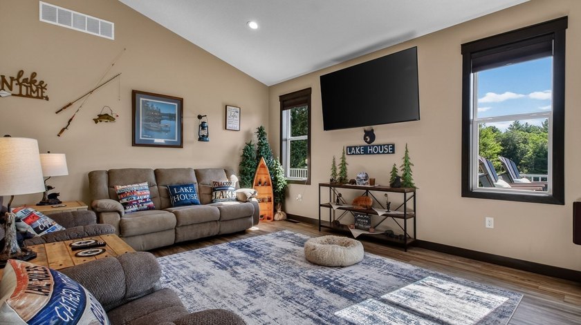 Enjoy lakefront living in this 4-bedroom, 3-bath home on scenic - photo 3