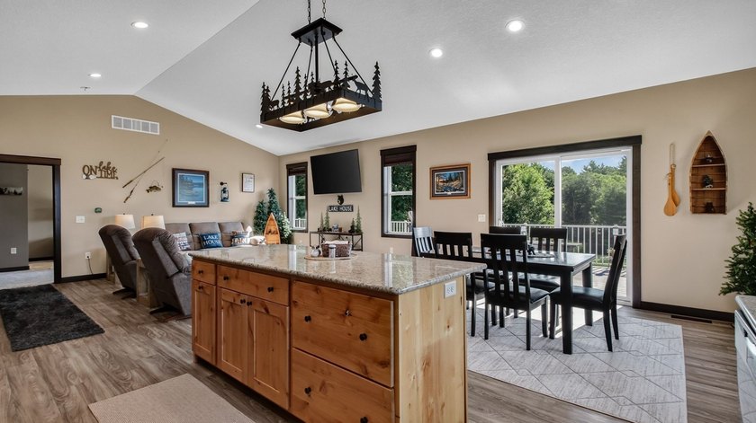 Enjoy lakefront living in this 4-bedroom, 3-bath home on scenic - photo 6
