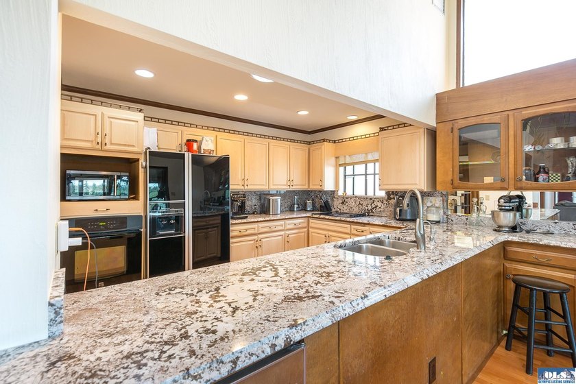 Welcome to this beautiful single-level condo nestled in the - photo 16