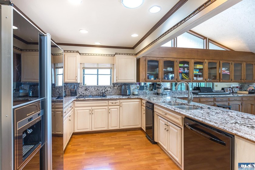 Welcome to this beautiful single-level condo nestled in the - photo 17