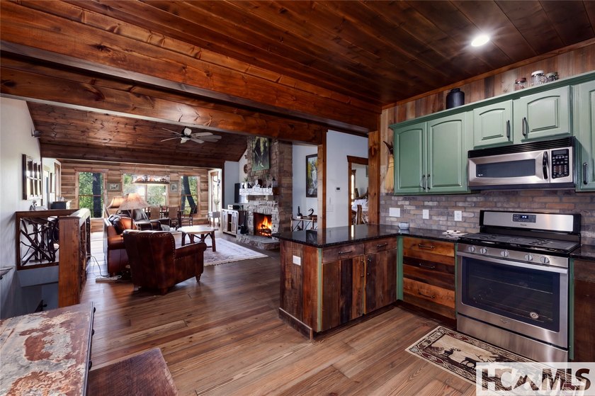 Nestled among the trees with sweeping mountain views, this - photo 5