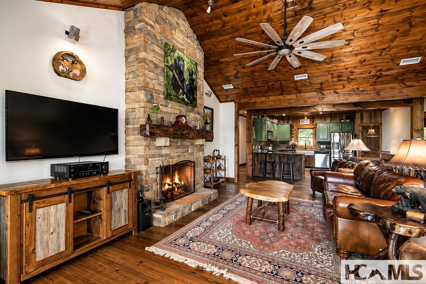 Nestled among the trees with sweeping mountain views, this - photo 6