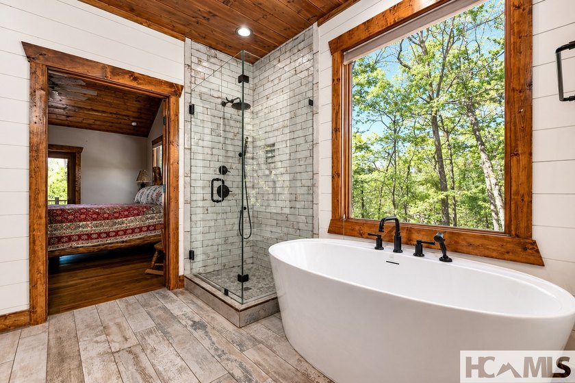 Nestled among the trees with sweeping mountain views, this - photo 8