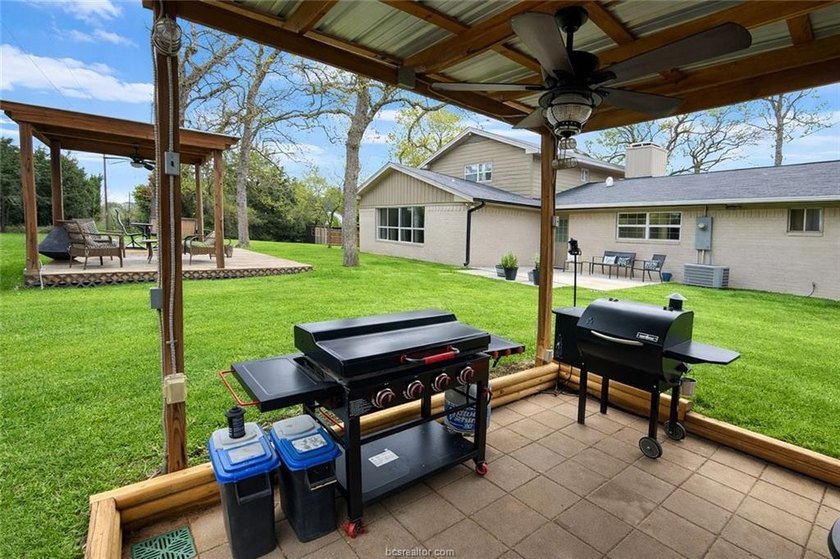 Set on nearly an acre of land, this one-of-a-kind property - photo 2