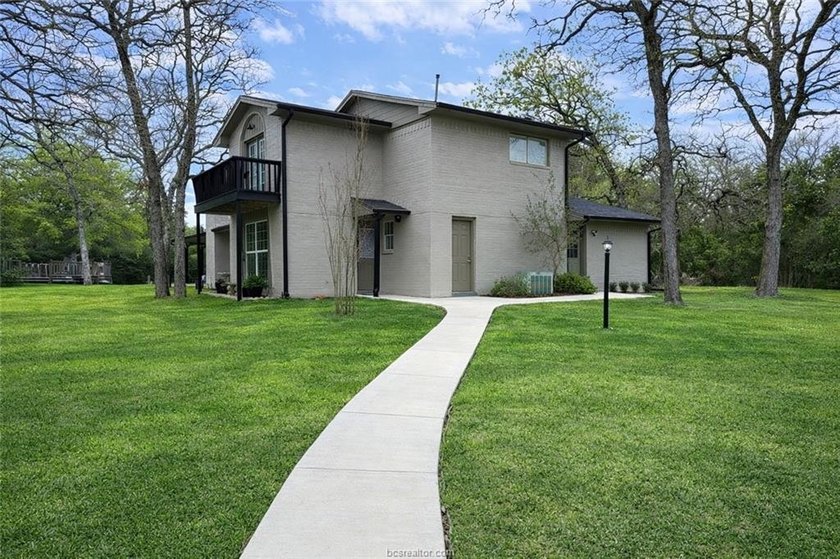 Set on nearly an acre of land, this one-of-a-kind property - photo 6