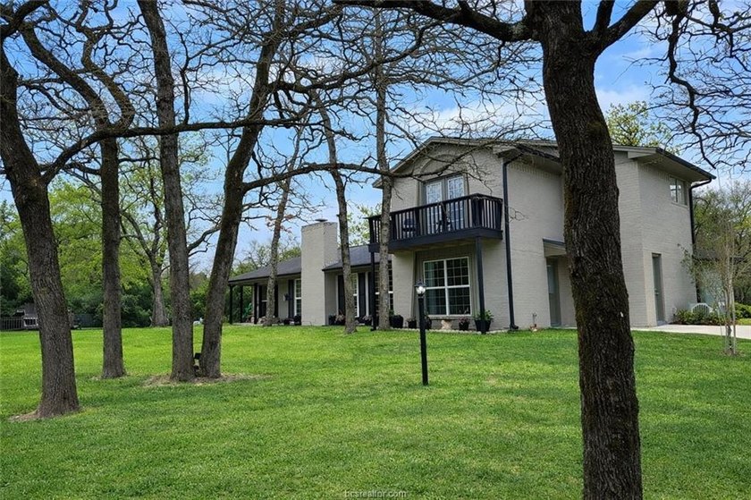 Set on nearly an acre of land, this one-of-a-kind property - photo 7