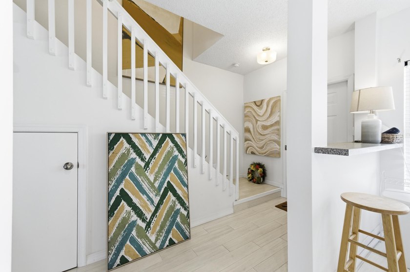 Beautiful two-story corner townhouse offering two bedrooms and - photo 9