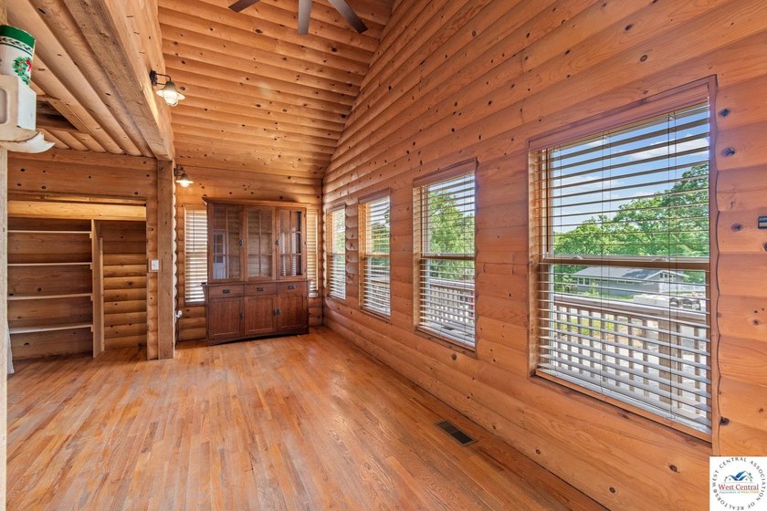 Experience the rustic charm of this log-sided home with stunning - photo 5