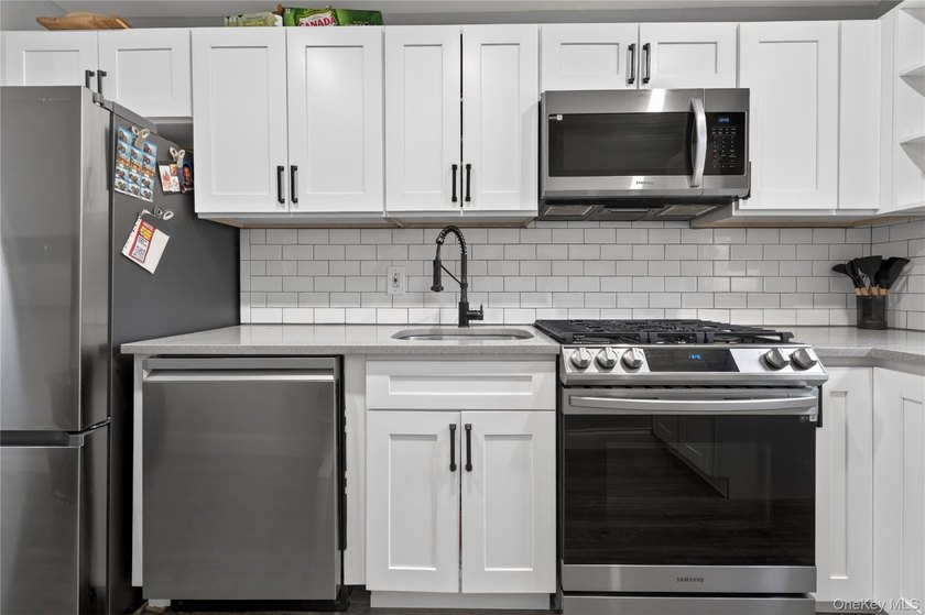 Gut Renovated True 3 Bedroom Upper Unit In The Heart Of - photo 7