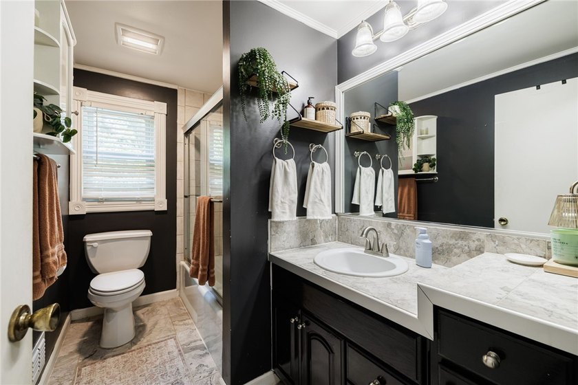 Welcome home to this beautifully updated split-level in the - photo 15