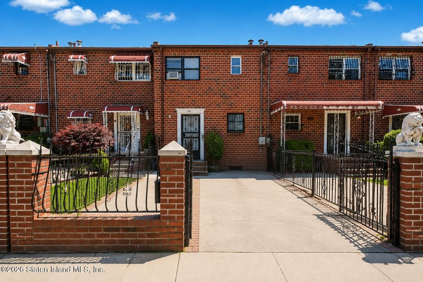 Welcome to this charming two-story brick rowhome in the heart of - photo 3