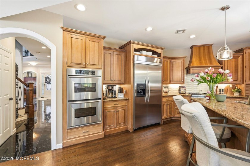 Offered for the first time, this custom-built home is nestled on - photo 46