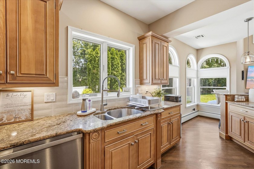 Offered for the first time, this custom-built home is nestled on - photo 50