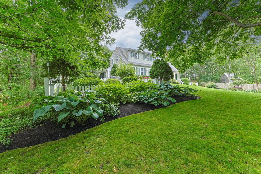 This one-of-a-kind Cape Cod with Colonial charm set on 1.3 - photo 2