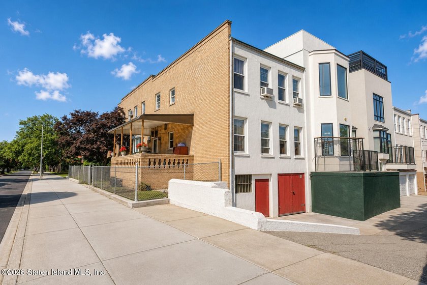 Welcome to this solid brick 5/5 two-family semi-attached home - photo 4