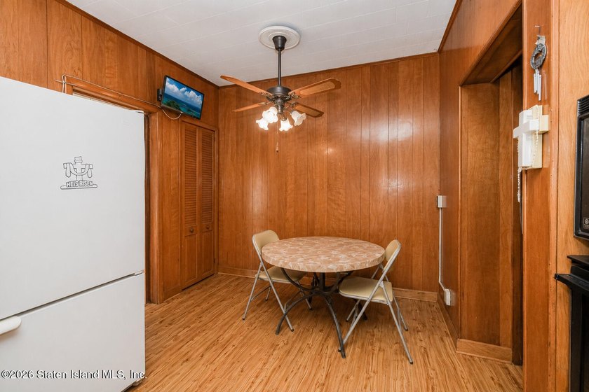 Welcome to this solid brick 5/5 two-family semi-attached home - photo 9