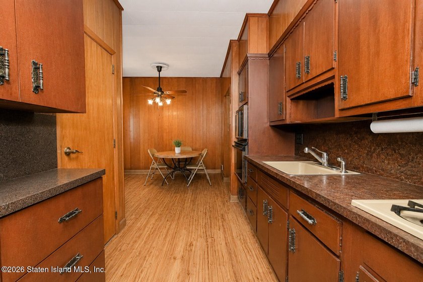 Welcome to this solid brick 5/5 two-family semi-attached home - photo 10