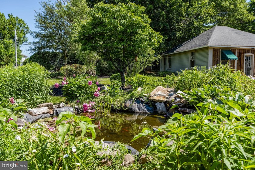 Nestled on a spacious .45 Acre lot, this timeless 4 bdrm, 1-1/2 - photo 50