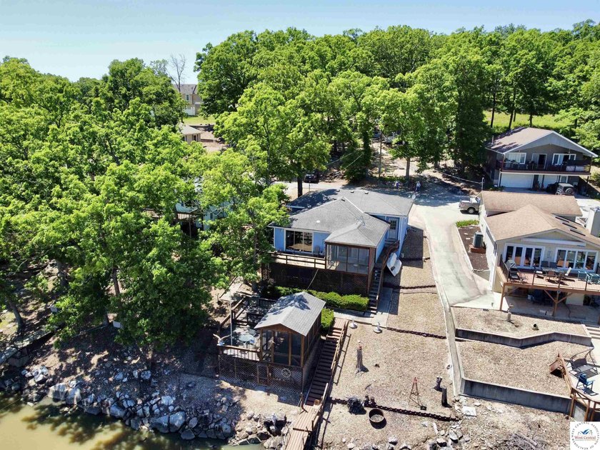 Located on a quiet cove on the Lake of the Ozarks in a very - photo 4